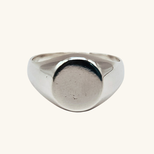 Silver ring on a white background