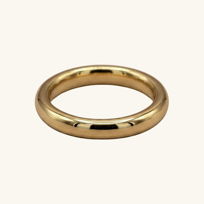 Gold ring on a white background