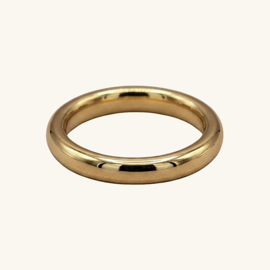 Gold ring on a white background