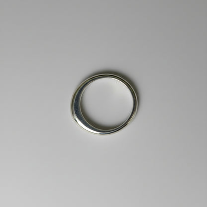 Silver ring on a grey background