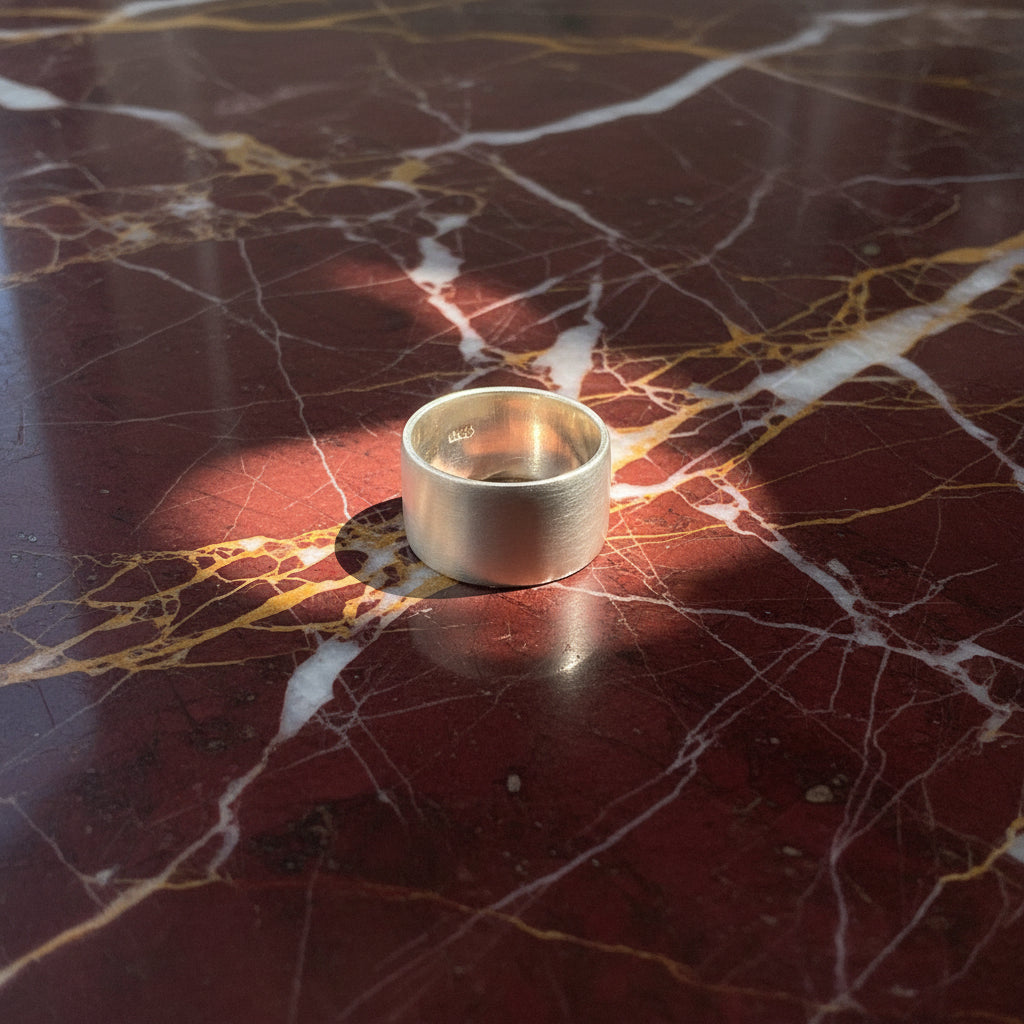 Round metallic ring on a marble background